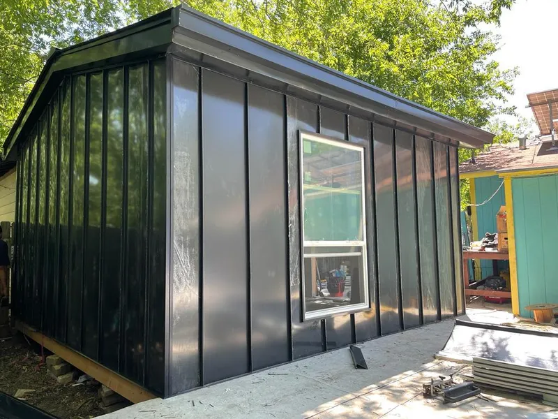 Black standing seam metal wall panels for Metal Roof Installation in Winchester